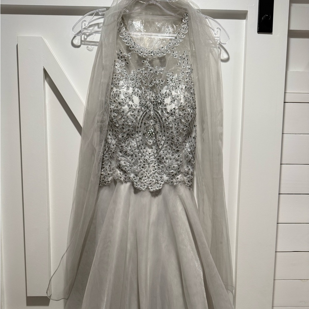 Elegant Silver Embellished Gown with Sheer Overlay